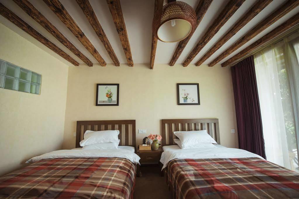 Li Jiang Wish Villa Hostel Лицзян Экстерьер фото